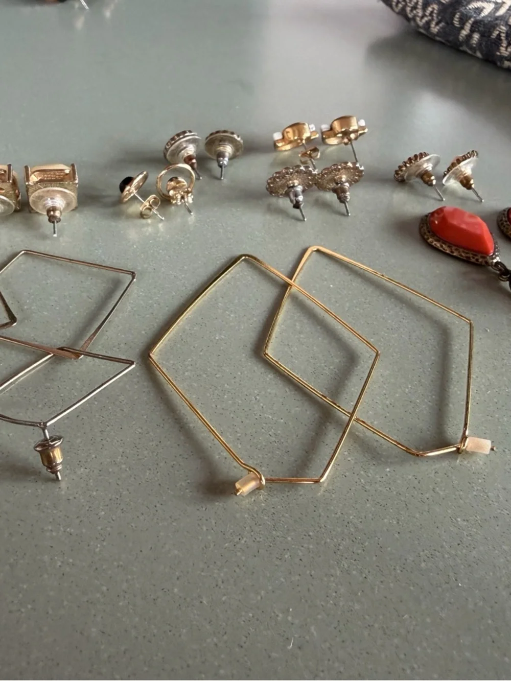 Lot - 9 pairs stud and dangle statement earrings